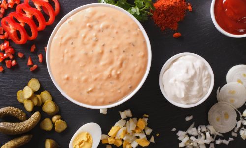 Thousand Island Dressing with ingredients close-up. horizontal top view