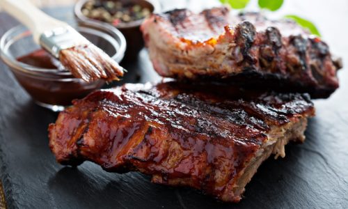 Grilled pork baby ribs with barbecue sauce