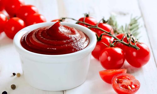 Fresh homemade tomato sauce in a white bowl